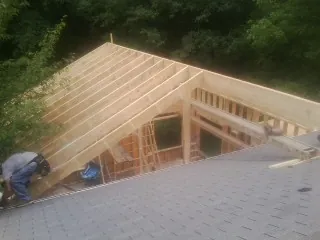 Framing a new roof addition that ties into an existing shingle roof in Cedar Run